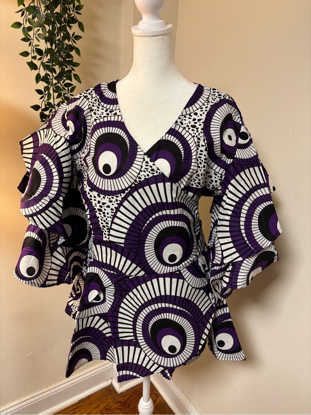 V-Neck Peplum Tunic in Purple and White Graphic Print